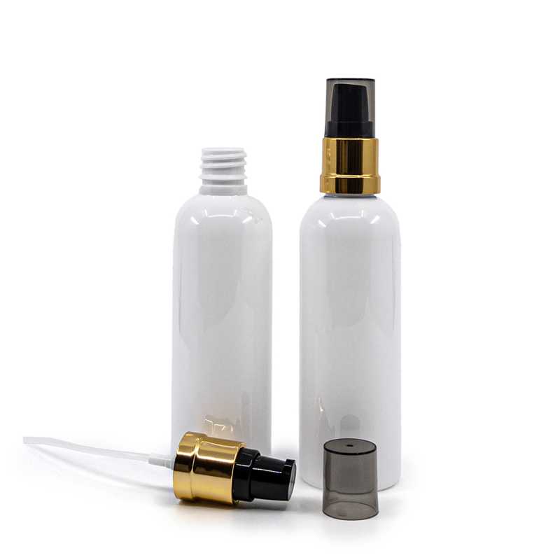 Flacone di plastica bianco, pompa nera e dorata lucida con sopra-tappo fumé, 100 ml
