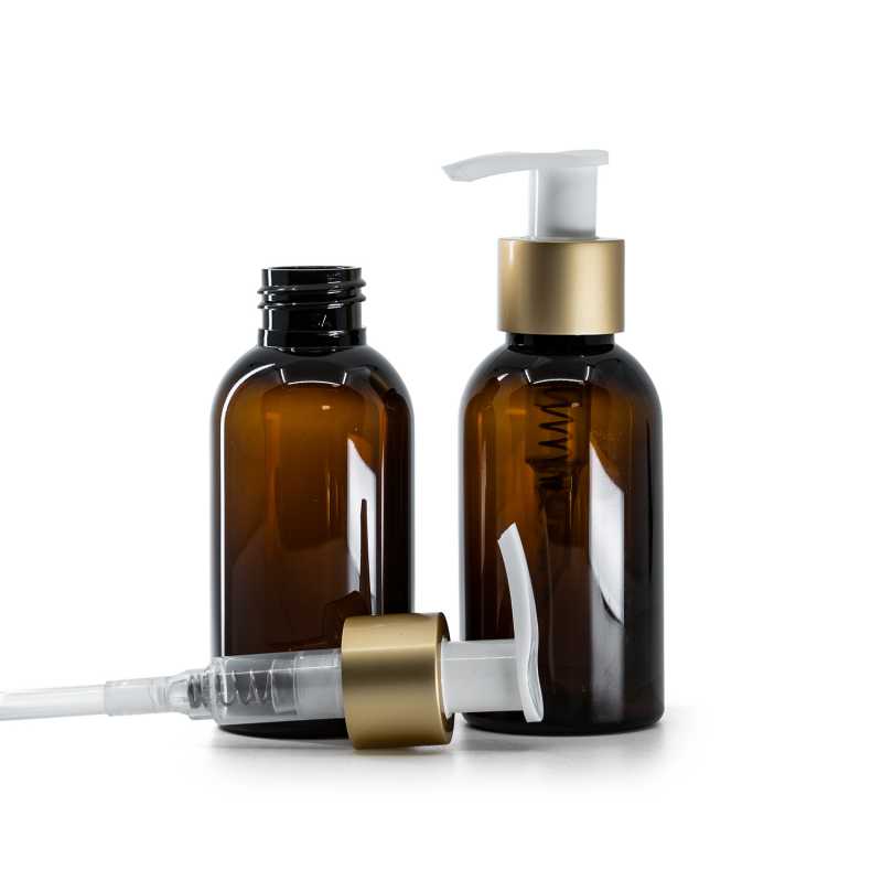 Flacone di plastica marrone, pompa bianca con collare oro opaco, 100 ml