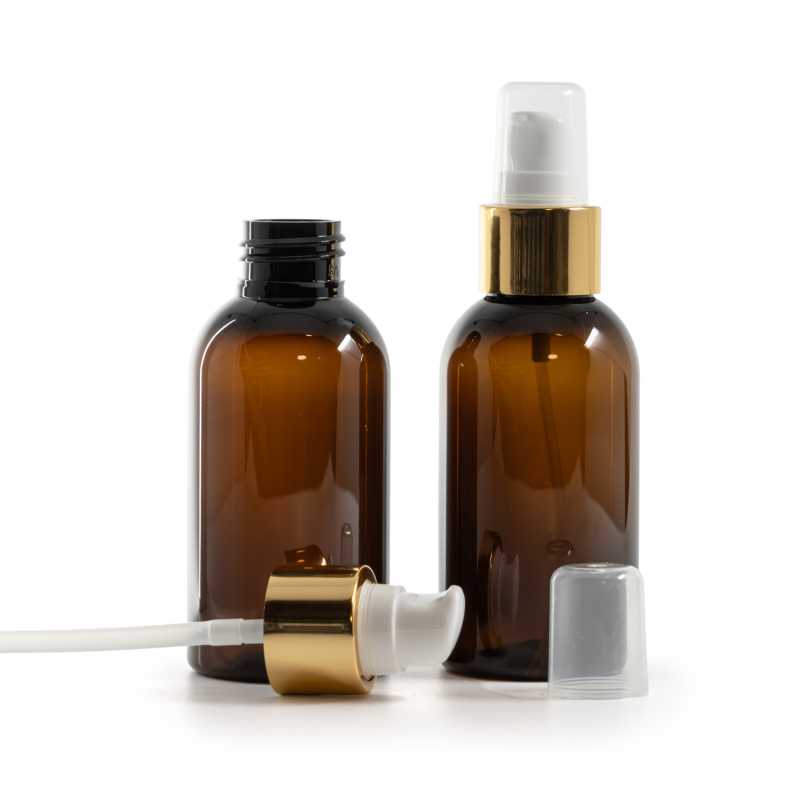 Flacone di plastica ambra, pompa bianca con sopra-tappo oro lucido, 100 ml