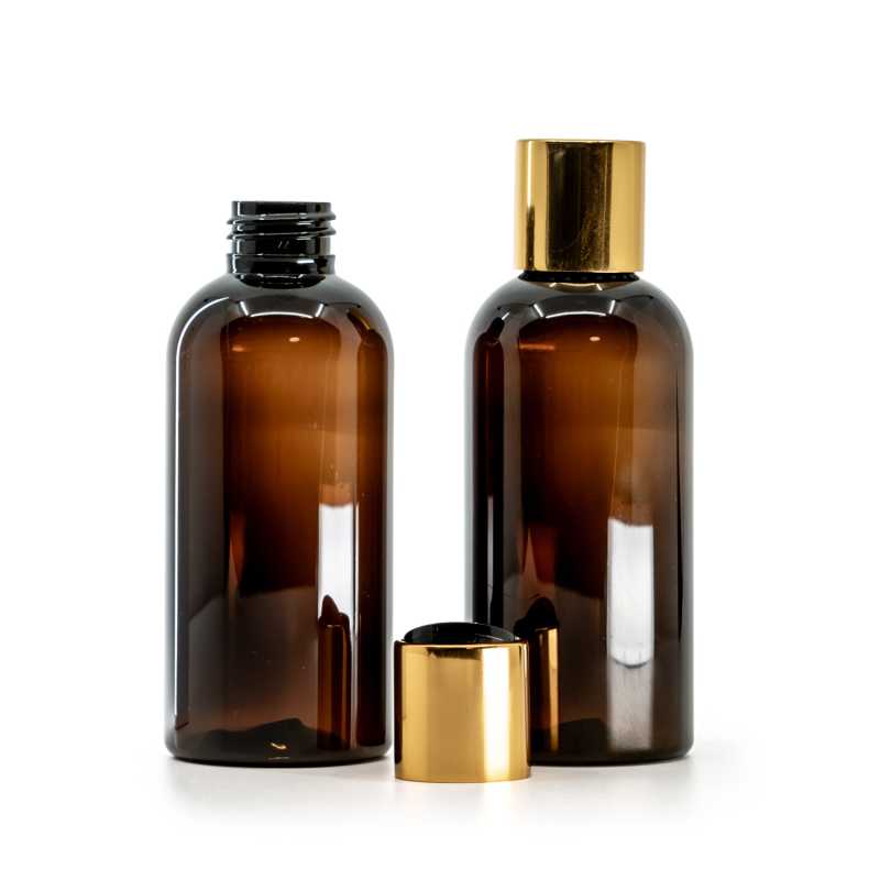 Bottiglia di plastica ambra, tappo disc-top dorato con centro nero, 150 ml