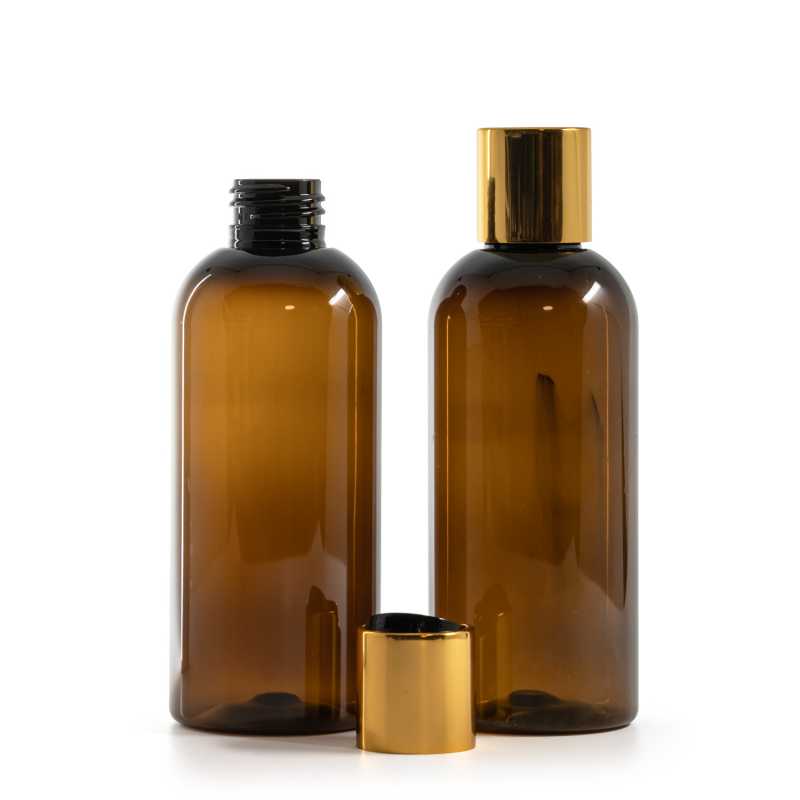 Bottiglia di plastica marrone, tappo disc-top, dorato, parte centrale nera, 200 ml