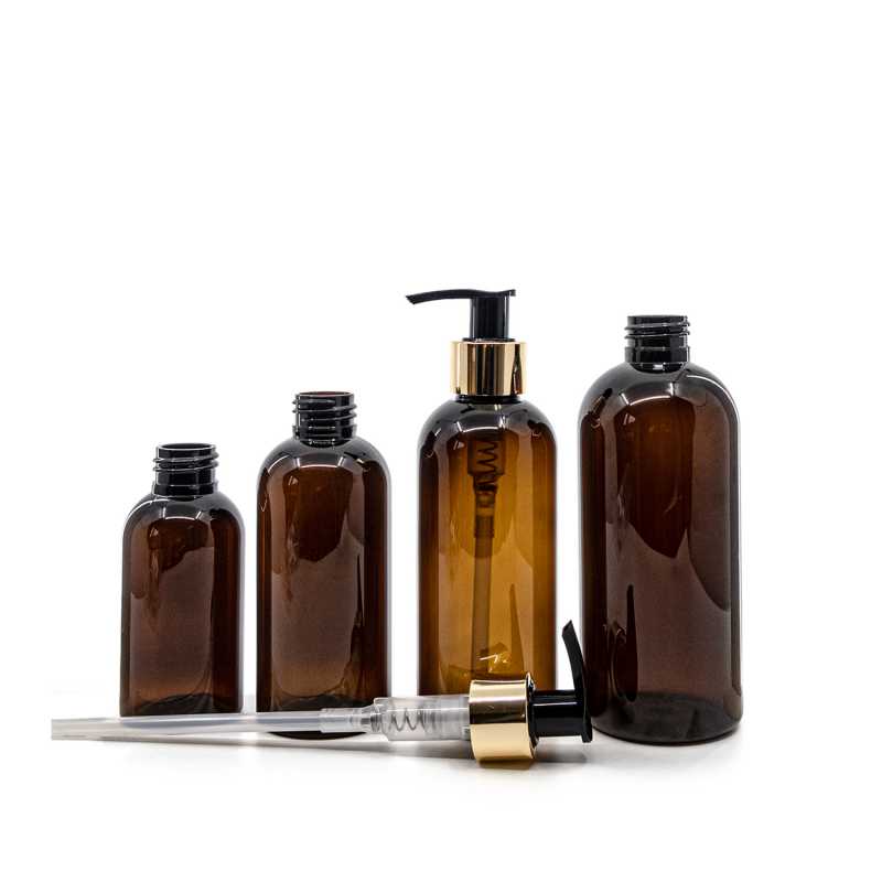 Flacone di plastica marrone, pompa in plastica dorata, 100 ml
