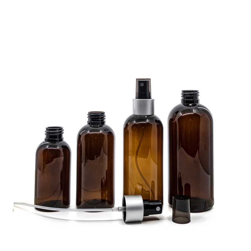 Bottiglia di plastica ambra, spruzzatore nero, anello argento opaco, sopra-tappo fumé, 150 ml