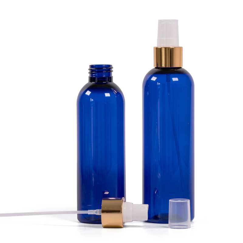 Bottiglia di plastica blu, spruzzatore bianco, anello dorato lucido, 200 ml