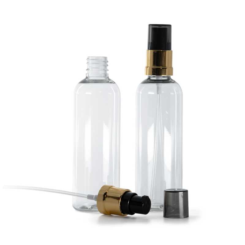 Flacone di plastica trasparente, dosatore nero e dorato lucido con sopra-tappo fumé, 100 ml