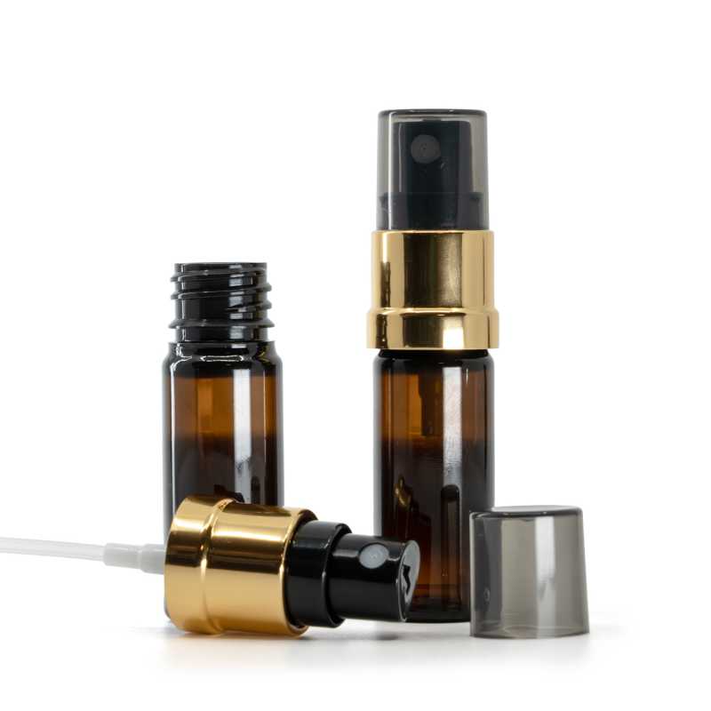 Flacone di plastica ambra, spruzzatore nero e oro, sopra-tappo fumé, 10 ml