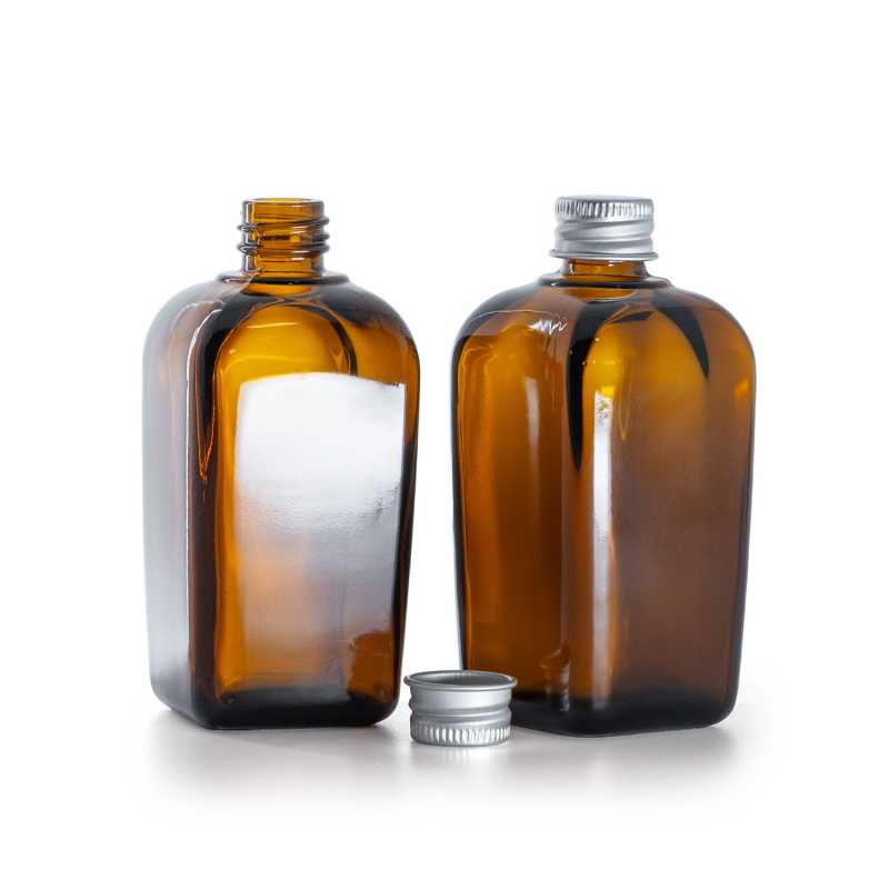 Flacone quadrato in vetro ambrato, capsula in alluminio argento, 90 ml