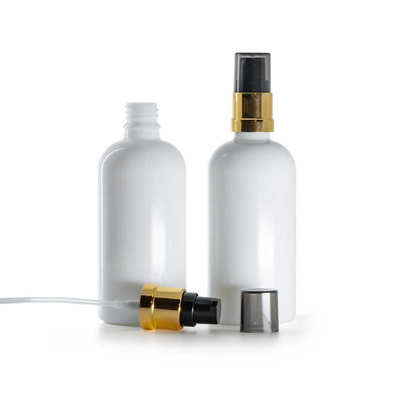 Flacone di vetro bianco, pompa nera e dorata lucida con sopra-tappo fumé, 100 ml