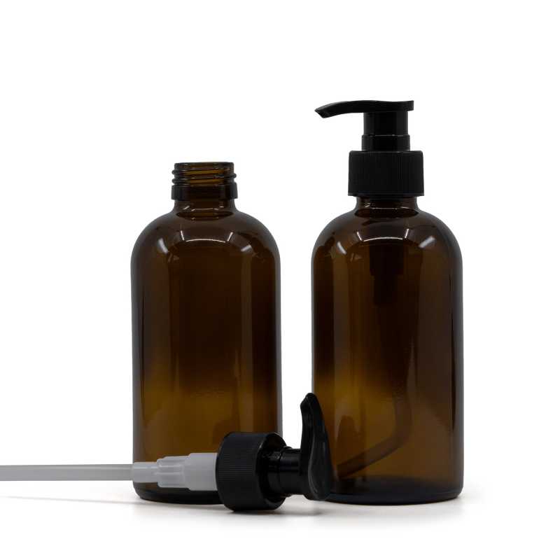 Bottiglia Boston in vetro ambra, dosatore nero, anello zigrinato, 250 ml