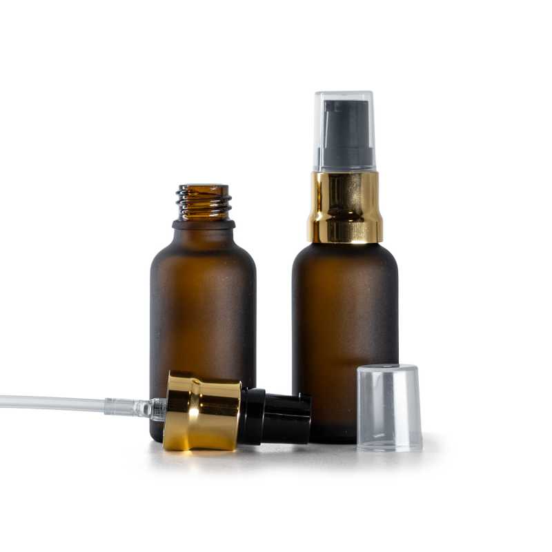 Bottiglia in vetro, ambra opaca, pompa nera dorata lucida, cappuccio trasparente, 30 ml