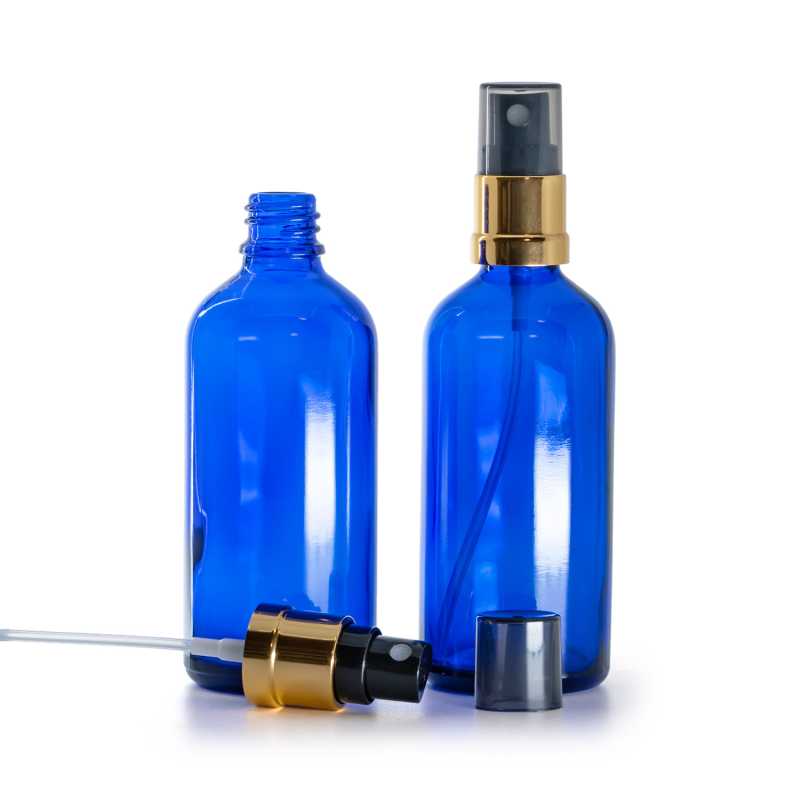 Flacone di vetro blu, spruzzatore nero e dorato, sopra-tappo fumé, 100 ml