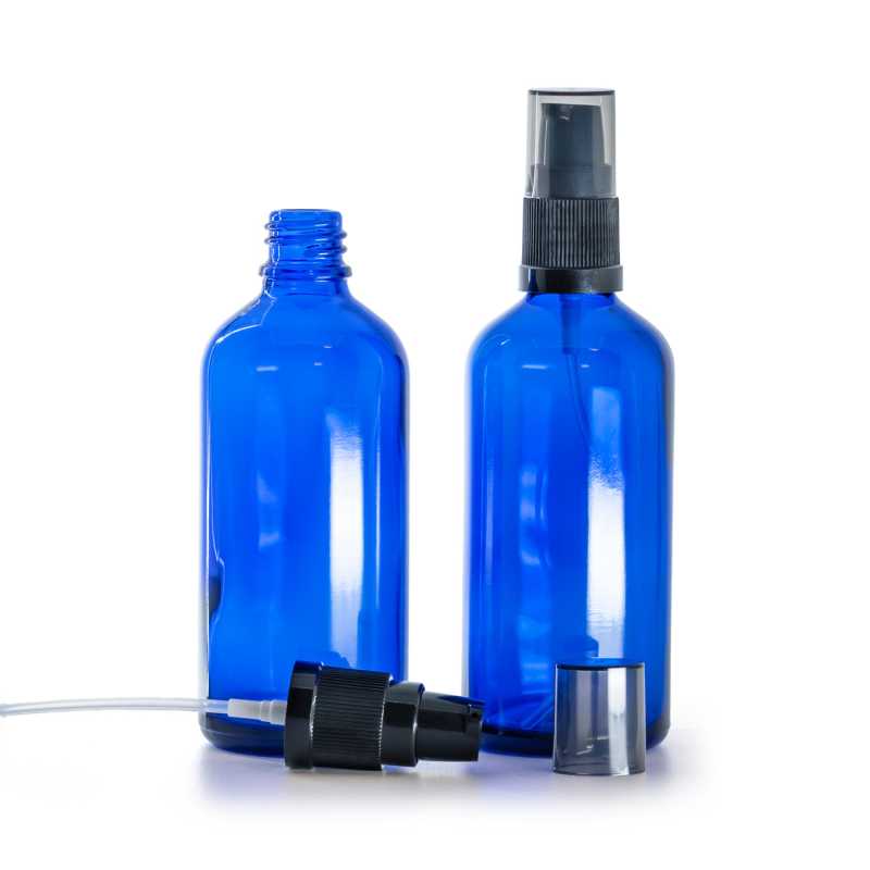 Flacone di vetro blu, pompa lozione con sopra-tappo fumé, 100 ml