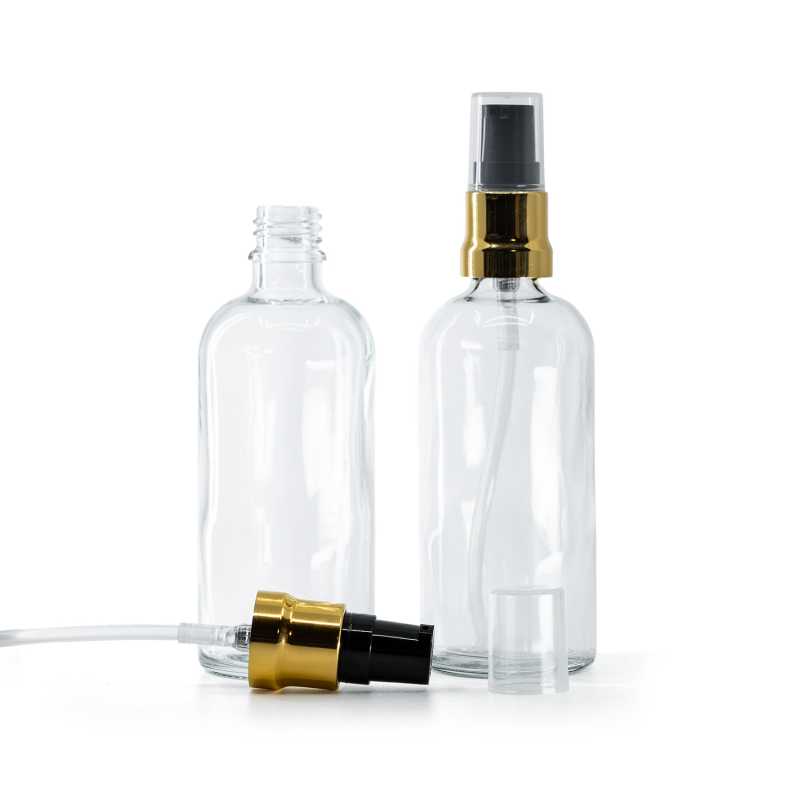 Bottiglia in vetro, trasparente, dosatore nero e oro lucido, cappuccio trasparente, 100 ml