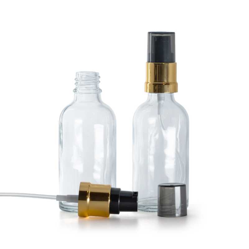 Flacone di vetro trasparente, pompa lucida nero e oro con sopra-tappo fumé, 50 ml