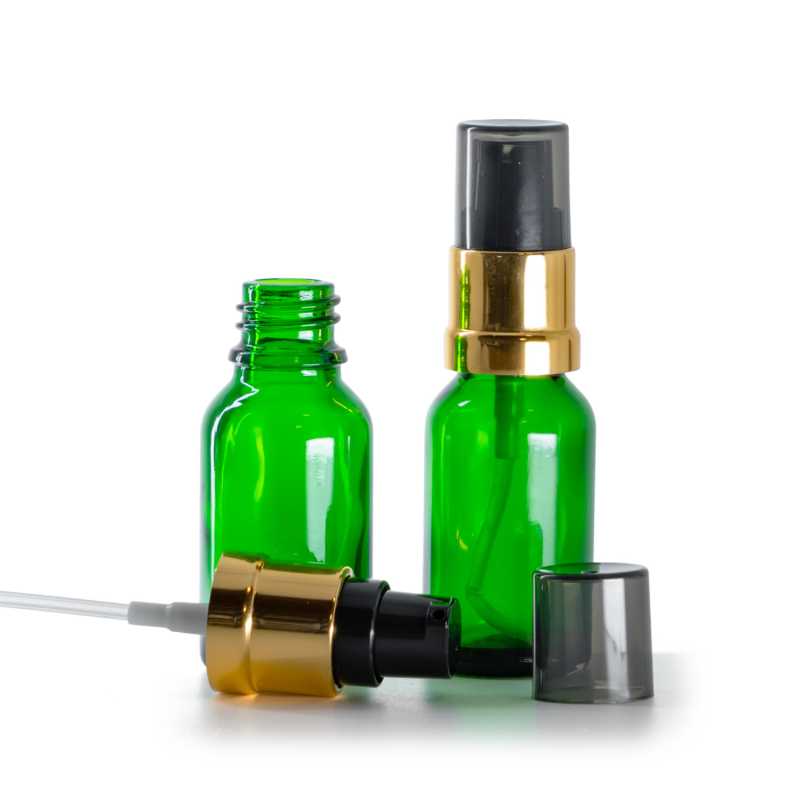 Flacone di vetro verde, pompa nera e dorata lucida con sopra-tappo fumé, 15 ml