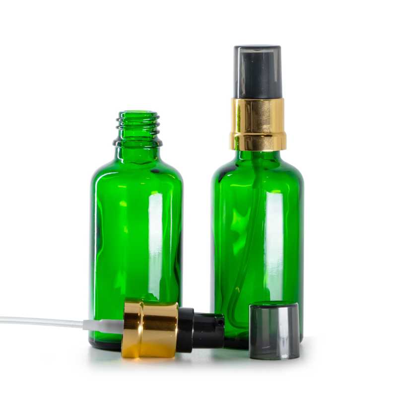 Flaconcino di vetro verde, dosatore nero e dorato lucido con sopra-tappo fumé, 50 ml