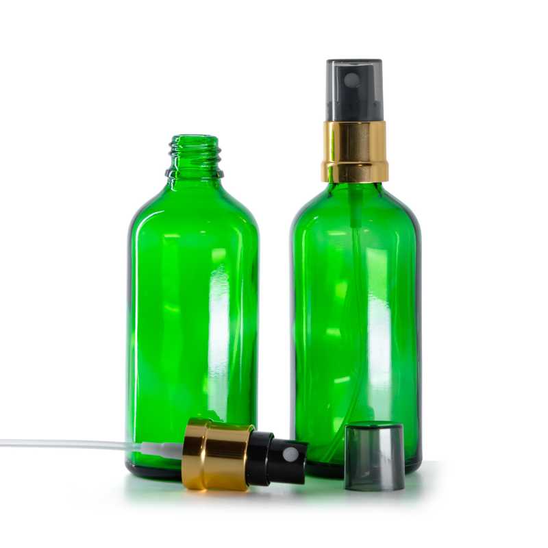 Flacone di vetro verde, spruzzatore nero e oro, sopra-tappo fumé, 100 ml