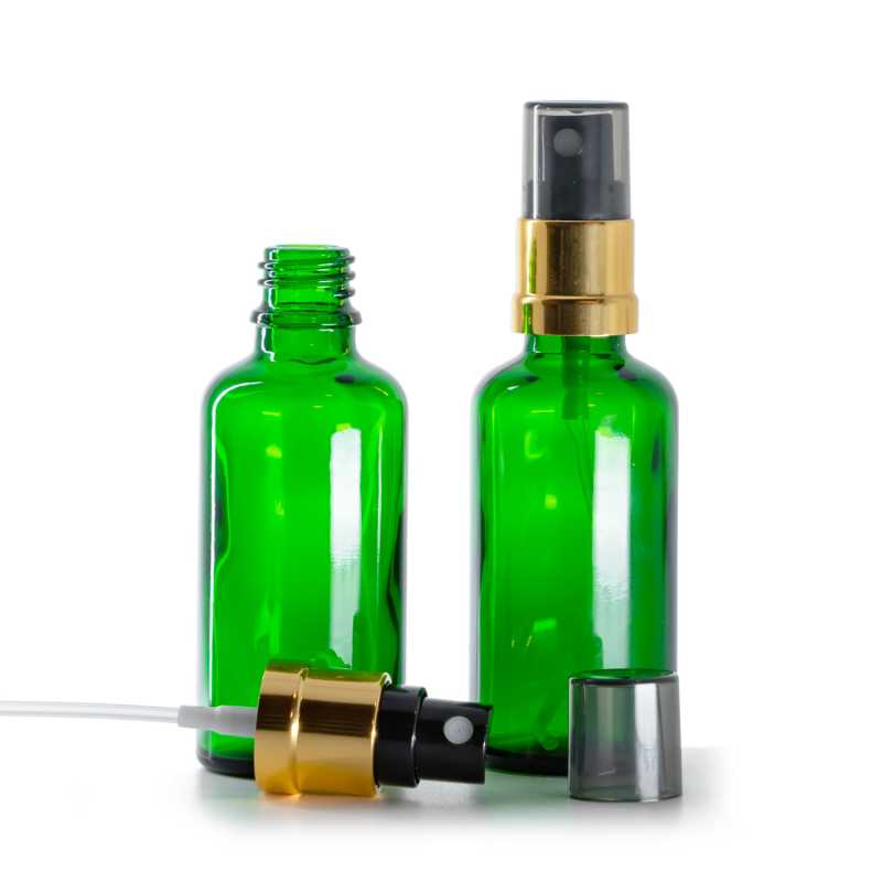 Flacone di vetro verde, spruzzatore nero e dorato con sopra-tappo fumé, 50 ml