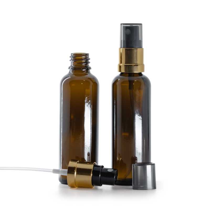 Flaconcino di vetro ambra, slanciato, spruzzatore nero e dorato con sopra-tappo fumé, 50 ml